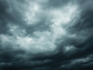 Obraz premium Dramatic storm clouds gathering ominously over a landscape