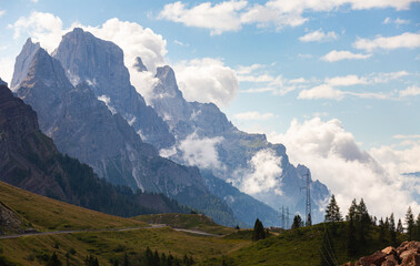 Fototapeta premium Breathtaking scenery featuring rocky mountain peaks on sunny summer day. Enchanting nature of Dolomites, Italy..