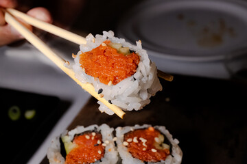 Spicy tuna roll at restaurant table 