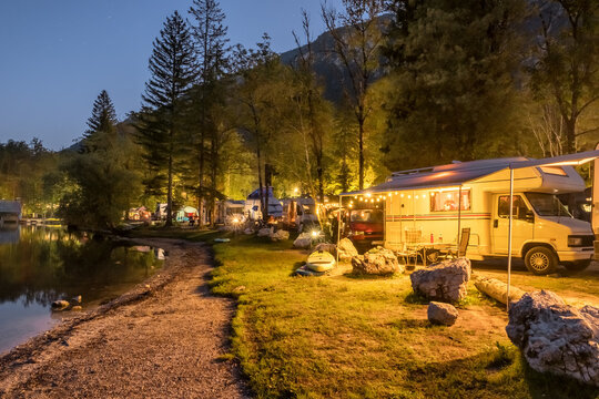 Camping site at the water edge of Bohinjsko Jezero in the Julian Alps, Slovenia.