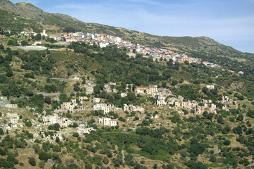 Fototapeta premium Ruins of the abandoned ghost town Gairo Vecchio, Sardinia, Italy. Ogliastra. Sardegna. Italia