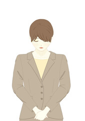 お辞儀をしているスーツを着た女性