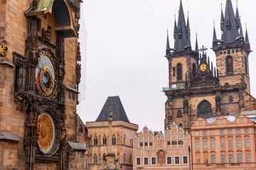 Obraz premium Prague astronomical clock and Church of Our Lady before Týn showing amazing architecture