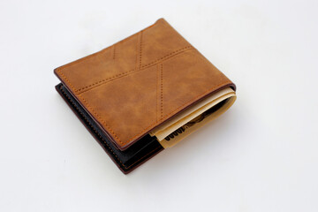 Brown wallet on white background.
