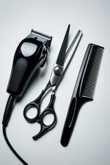Professional barber hair clipper, scissors, and comb. Equipment for haircut in a hairdresser salon. Premium hairdressing tools. Flat lay top view isolated on the background.