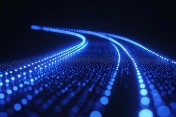 Luminous blue dots tracing paths in the dark creating futuristic light patterns