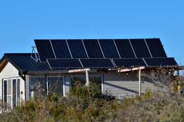 Fototapeta premium self-sustaining houses, water heaters and solar panels, ecology and sustainability