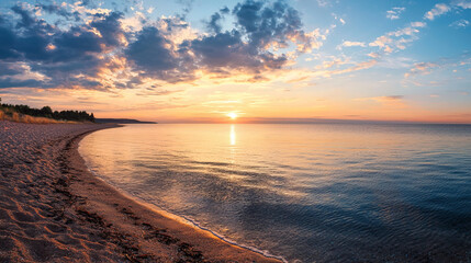 serene beach at sunset with calm waters and colorful clouds reflecting