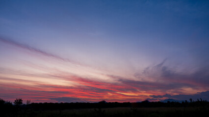Landscape of sunrise sky background with gentle colorful clouds