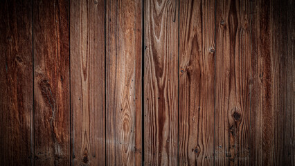 Naklejka premium close-up of a weathered beautiful wood fence antique background or presentation template with space for copy