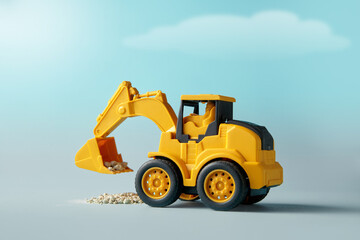 yellow excavator toy is digging up rubble