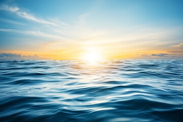 Obraz premium Serene Sunset Over Calm Ocean Waves with Gentle Reflections