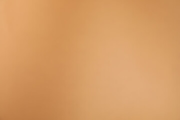 Light brown gradient background. Abstract color backdrop for design