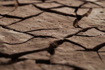 Dry cracked ground as background, closeup. Global warming