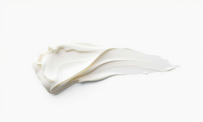 Creamy white texture spread on surface, showcasing smoothness and richness. Ideal for beauty, skincare, or culinary themes