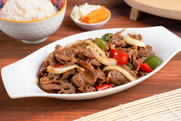 Asian Food: Teriyaki Beef with Onions and Peppers. Perfect for recipe, article, catalogue, or any commercial purposes. With copy space