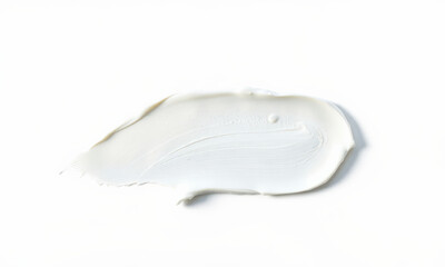 smooth cream smudge on white background, ideal for beauty or art projects. This versatile texture can enhance various designs and presentations