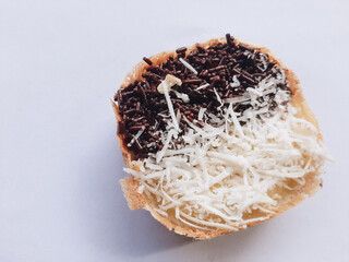 view of mini Martabak or moonlight on a white background. is a traditional Indonesian snack that has a soft texture with a buttery and sweet taste.