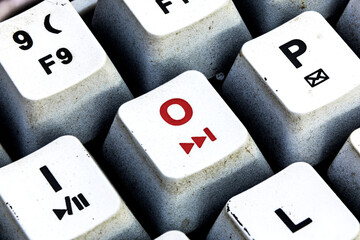Retro Keyboard with O button in red color. O button keyboard in close up macro