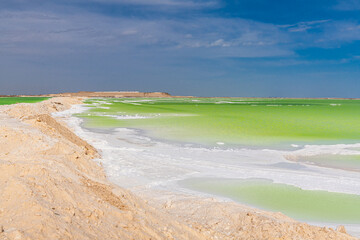 Fototapeta premium Salt and emerald water of Qarhan or Chaerhan lake around Golmud city, Qinghai, China