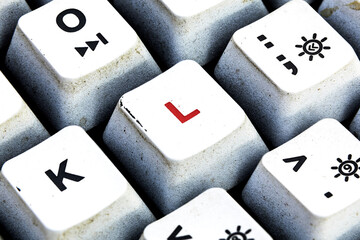 Retro Keyboard with H button in red color. H button keyboard in close up macro
