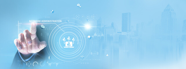 Network Administration: Businessman touching and configuring routers, managing servers, monitoring traffic, optimizing performance, ensuring security, troubleshooting issues, overseeing connectivity.