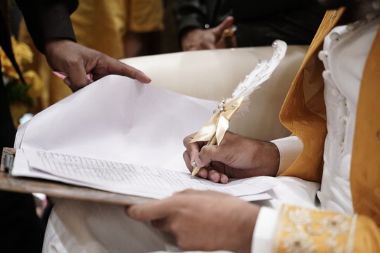  Muslim Groom Signing his Nikah Nama, Marriage License