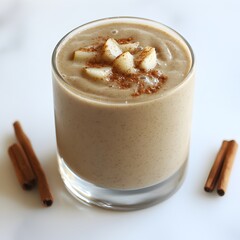 Smooth drink with cinnamon and fresh flavors isolated on a bright white background for healthy beverage options