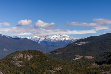 Snow-Capped Chief Mountain Under Blue Sky in Scenic Squamish, BC Landscape