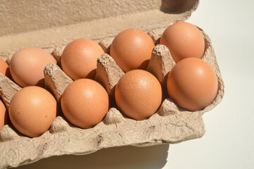 a carton of eggs, a box of eggs, tray of eggs. Conceptual photo of the rising price of eggs, egg shortage. 