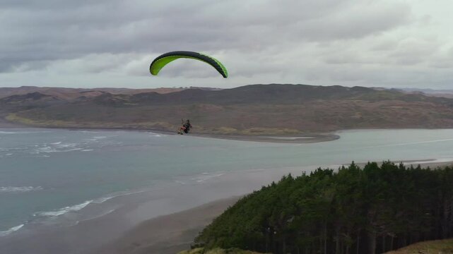 Aerial view from paragliding flying over the beach of New Zealand