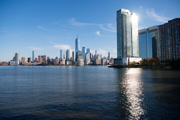 Fototapeta premium The skyline of New York City, United States, USA. NYC landmarks. Amazing panorama view of New York city skyline and skyscraper at sunset. Beautiful night view in Midtown Manhattan.