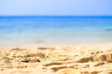 Nature of the beach and sea Summer with sunshine, sandy beaches, clear blue waters sparkling against the blue sky. On an island with good ecology and environment Background for summer vacation