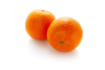 fresh juicy oranges isolated on a white background