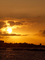 Sunset Over Coastal Town