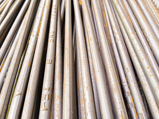 Close up of Steel rods bars,  metal rebar construction, can be used to reinforce concrete.