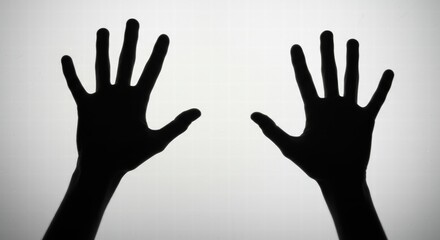 Obraz premium Silhouette of a person's hand as an anti-bullying symbol