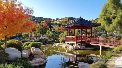 Fototapeta premium A scenic oriental garden scene with water and a red structure