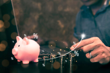 Businessman arranging coins to calculate income and return on investment in percentage about...