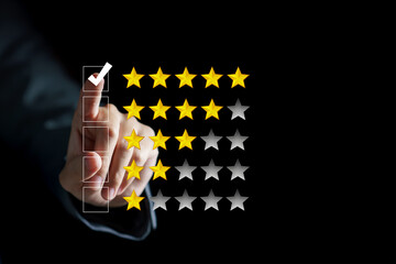 Hand touching and doing mark to five yellow stars on black background, the best customer...