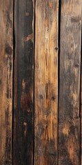 A set of rustic wooden planks with a burnt, weathered finish is arranged vertically to showcase their natural grain and aged texture.