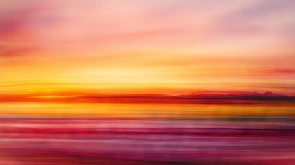 Obraz premium 48.A tranquil and serene long-exposure capture of the calm sea at sunset, with the water appearing smooth and almost glass-like, blending harmoniously with the vibrant hues of the sky as the sun