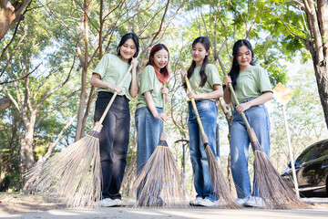 Friends Volunteering for Community Clean-Up in Park, Big Cleaning Day Concepts