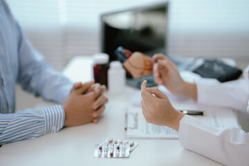 Doctors consult with patients in the clinic to provide medical advice, diagnosis and treatment....