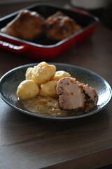 Traditional Czech Roast Pork with Sauerkraut and Potato Dumplings