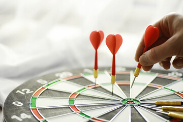 Darts. The dart for playing in the game board is stuck. Hit the sector in darts. The concept of a...