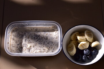 a healthy breakfast of overnight oats with milk, A bowl of overnight oats
