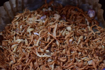 Serunding, dried meat floss made of beef or chicken, shredded chicken