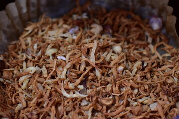 Serunding, dried meat floss made of beef or chicken, shredded chicken
