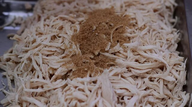 Serunding, dried meat floss made of beef or chicken, shredded chicken